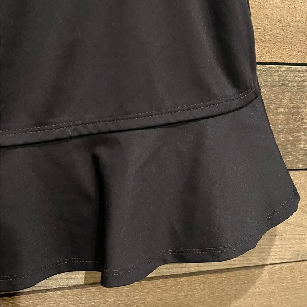 Tommy Bahama Women's Athletic Flounce Ruffle Hem Golf Skort in Black